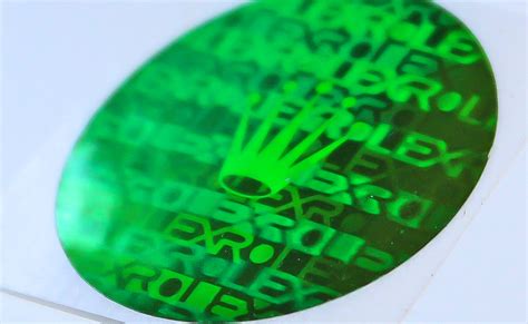 green hologram sticker on back of my rolex|Rolex holographic logo.